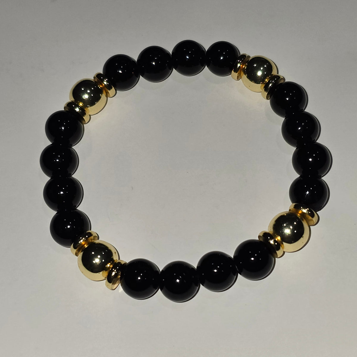 Black Onyx and Gold plated Hematite Bracelet