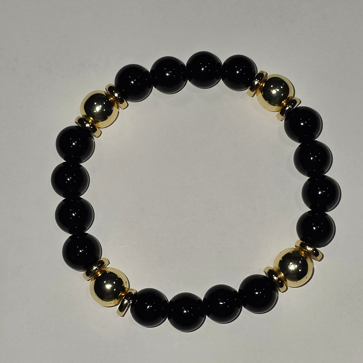 Black Onyx and Gold plated Hematite Bracelet